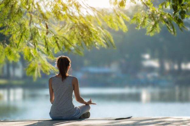 Woman enjoying the benefits of meditation therapy