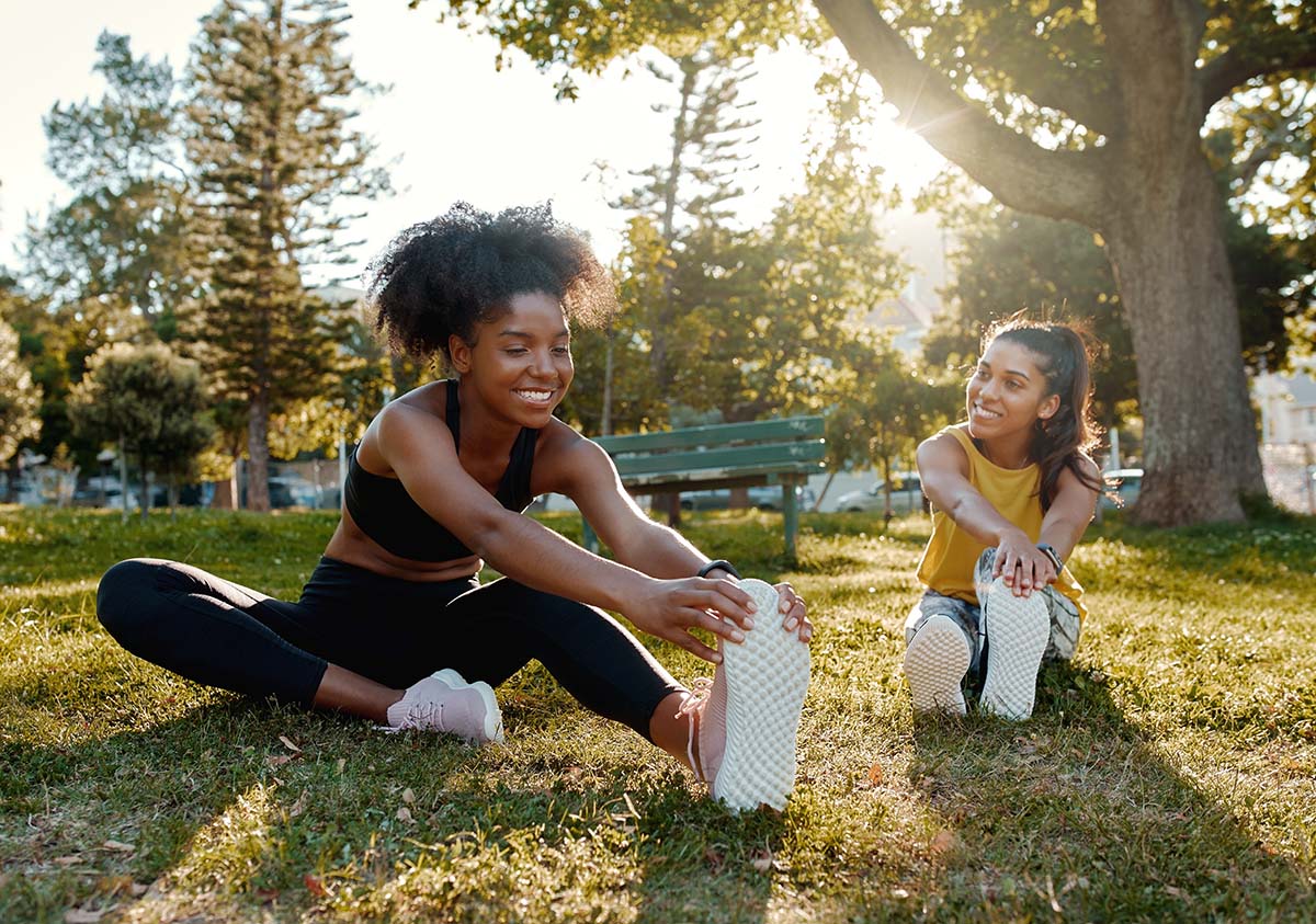 Two women engaged in exercise therapy for addiction